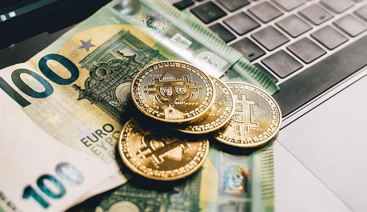 Money and Bitcoin on Keyboard Money and Bitcoin on Keyboard